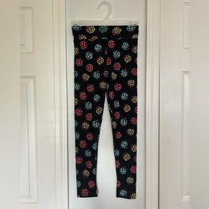 Black Leggings with Red, Blue, and Green Ladybugs